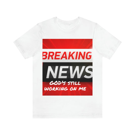 Lvad GOD’s Still Working Unisex Jersey Short Sleeve Tee